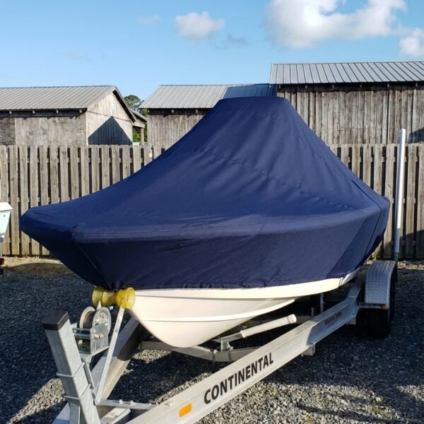 Grady White 192 Freedom center console boat cover in navy Sunbrella fabric on trailer at Beaufort NC boat yard