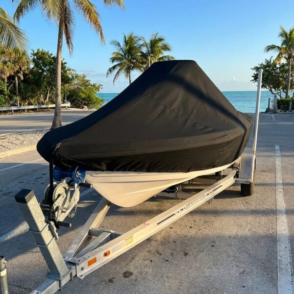 Grady White 205 center console boat cover in black Sunbrella fabric on trailer at Islamorada FL boat ramp
