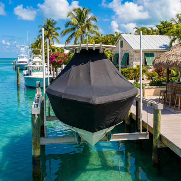 Scout 240 Bay T-Top boat cover in charcoal Sunbrella fabric on dock lift at Islamorada Florida Keys
