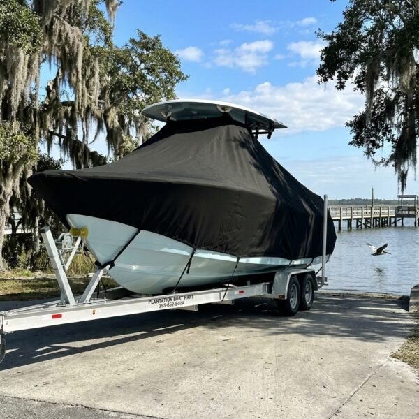 Sea Pro 206 T-Top boat cover in Black Sunbrella fabric on trailer at Winyah Bay boat ramp, Georgetown, SC