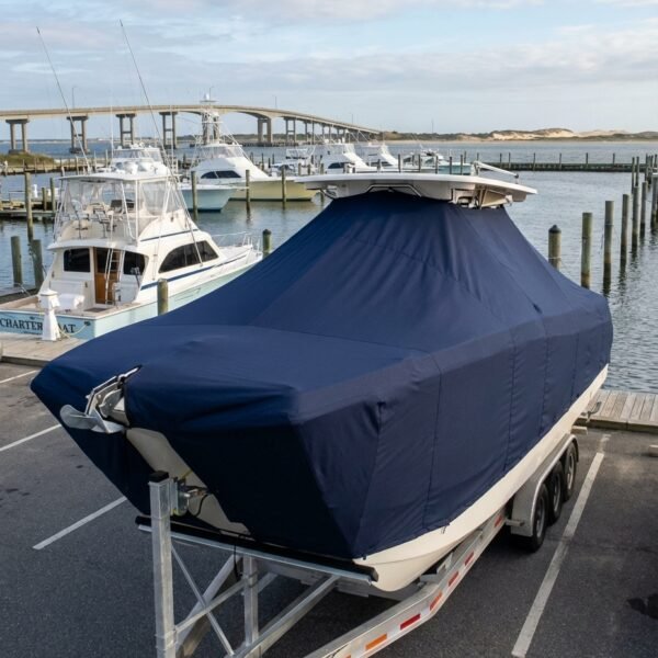 World Cat 296 DC catamaran boat cover in navy Sunbrella fabric on trailer at Outer Banks North Carolina Oregon Inlet