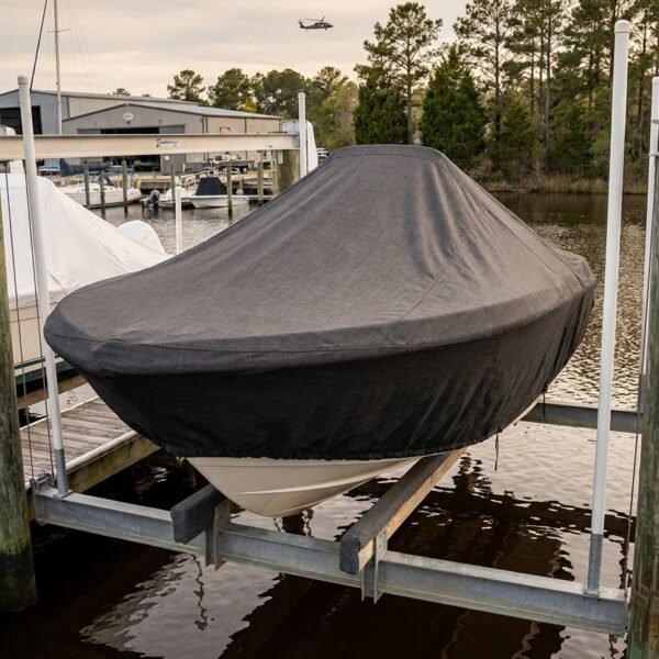 Savannah 19 IS center console boat cover in charcoal Sunbrella fabric on boat rack at New River, Jacksonville NC