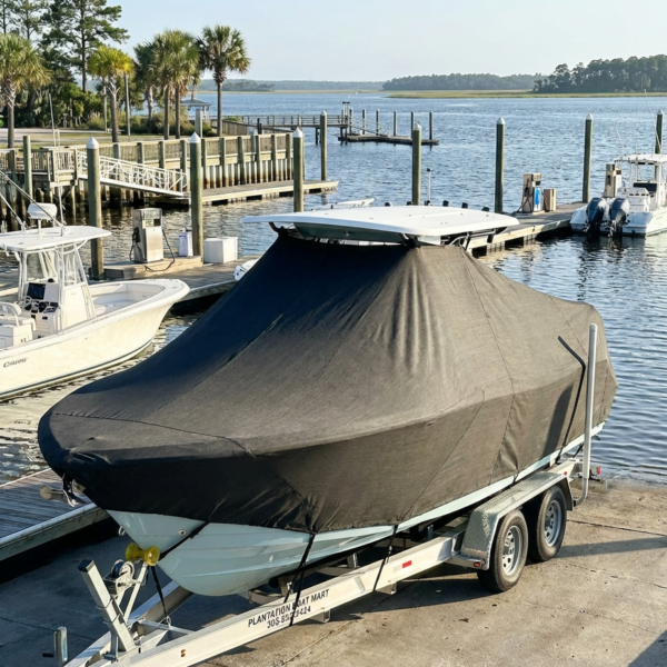 Sea Fox 199 T-Top boat cover in Charcoal Sunbrella fabric on dock lift at Georgetown Landing Marina, Georgetown, SC
