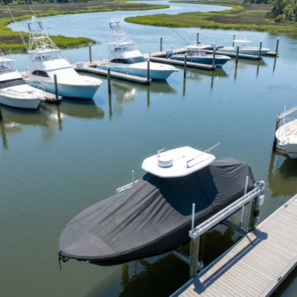 Sea Fox 206 Commander T-Top boat cover in Charcoal Sunbrella fabric on dock lift at Bohicket Marina, Kiawah Island, SC
