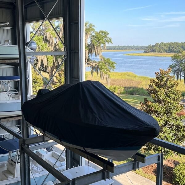 Sea Fox 216 Pro center console boat cover in Charcoal Sunbrella fabric on storage rack at Bluffton, SC