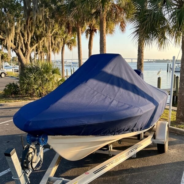 Sea Fox 226 center console boat cover in Navy Sunbrella fabric on trailer at New Smyrna Beach Marina, New Smyrna Beach, FL