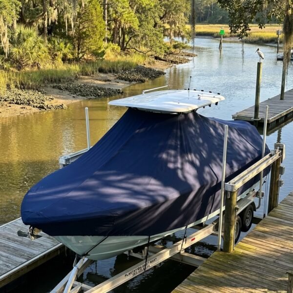 Sea Fox 226 Traveler T-Top boat cover in Navy Sunbrella fabric on dock lift at Dataw Island Marina, Dataw Island, SC