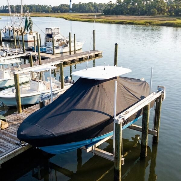 Sea Fox 230 T-Top boat cover in Charcoal Sunbrella fabric on canal lift at Hunting Island Marina, Hunting Island, SC