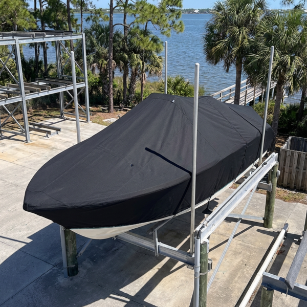 Sea Fox 240 Viper center console boat cover in Black Sunbrella fabric on storage rack at Fort Pierce City Marina, Fort Pierce, FL