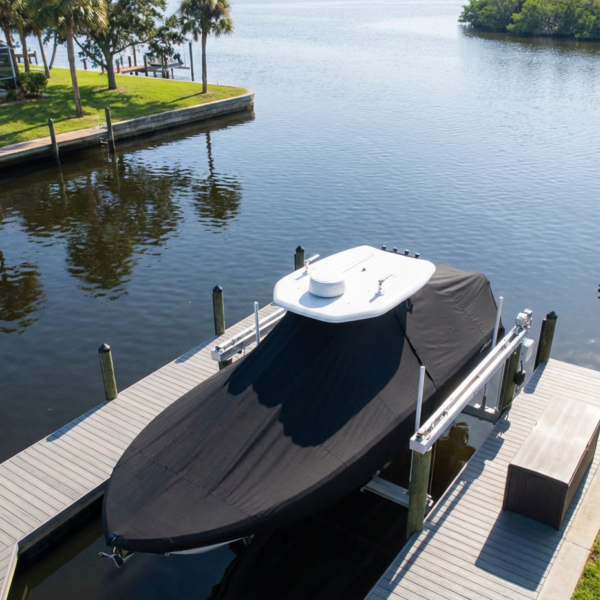 Sea Fox 256 center console boat cover in Black Sunbrella fabric on trailer at Pompano Beach Municipal Marina, Pompano Beach, FL