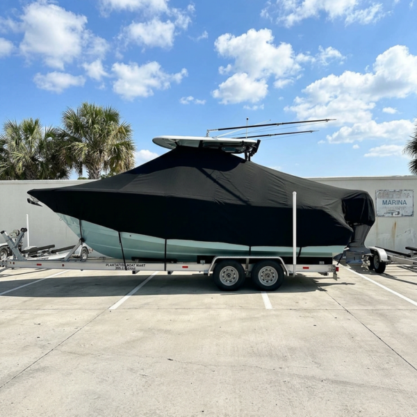 Scout 288 LXF T-Top boat cover in Black Sunbrella fabric on trailer at Charleston, South Carolina